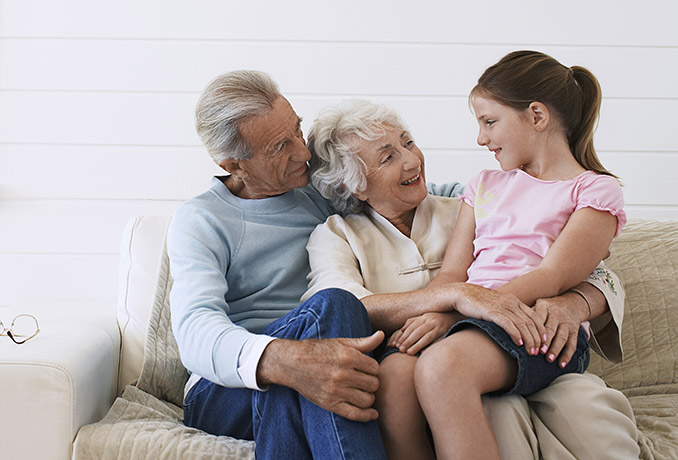 grandparents with granddaughter