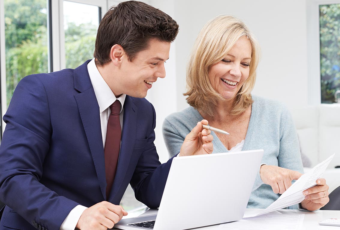 woman speaking with financial advisor
