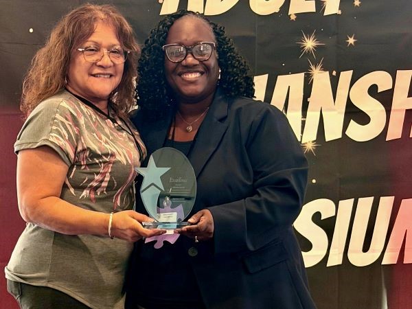Franciscan Health’s VASIA Director LaVonne Jarrett, right, recently received the WINGS Star of the Year Award from the Indiana Adult Guardianship Office of the Indiana Office of Court Services. Jarrett is pictured with VASIA Volunteer Coordinator Francisca Mendoza, left.