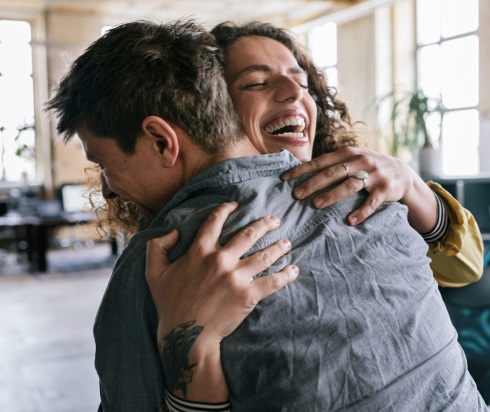 Two people hugging