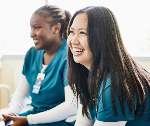 Smiling nurses in classroom