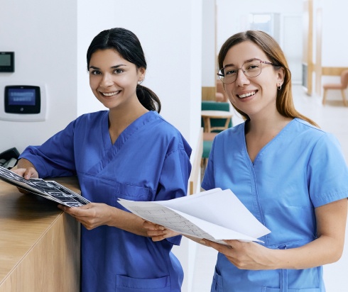 nurses smiling at nurses station