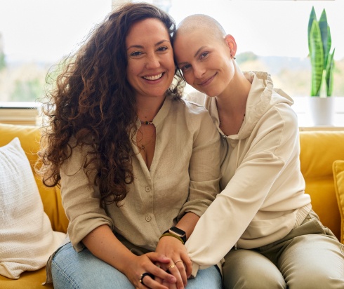 a cancer patient and a supportive family member