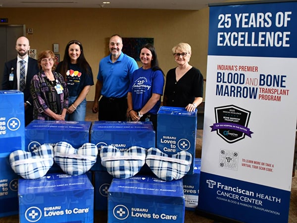 Tom King, administrative director of oncology for Franciscan Health in Central Indiana, Stacy Dickerson, stem cell lab manager at Franciscan Health, Tiffani Adkins, campaign development manager for the Leukemia & Lymphoma Society, Andy Thimlar, sales manager, Dreyer & Reinbold Subaru, Michelle Nees, program coordinator for Indiana Blood & Marrow Transplantation (IBMT) and Joan Himebrook, outreach and events manager for Franciscan Health.