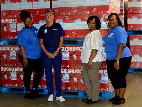 Franciscan Health's Prenatal Assistance Program recently received 400,000 Huggies diapers to support its Diaper Pantries. Pictured on delivery day are (l-r) Community Health Prenatal Care Program Manager, Prenatal Assistance and Supplementary Diaper Pantry Programs Doucette Alvarez; Prenatal Care Coordinator Christine Gesiakowski, RN; Community Health Specialist Carol Caruthers and Prenatal Care Coordinator, Prenatal Assistance and Diaper Pantry A'onesty Cross