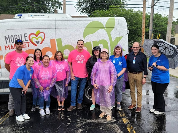 Korellis volunteers are seen here with Franciscan Health staff members at a past Mobile Market in Hammond. Korellis is sponsoring a Mobile Market in August to help with funding cuts impacting program.