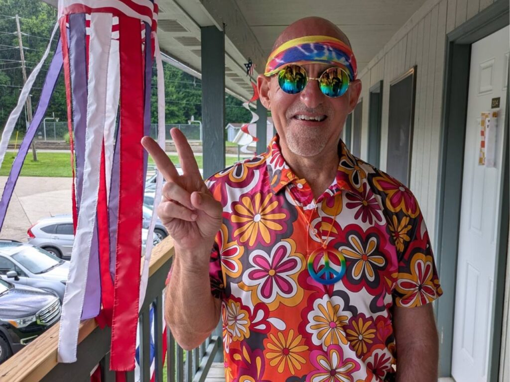 Brian Reith dressed in ‘70s apparel as part of a ‘70s Day theme at Franciscan Health Stroke Camp.