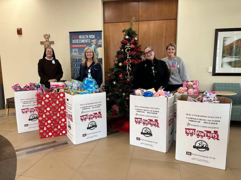 Franciscan Health staff with the boxes of toys received from a donation from Toys for Tots.