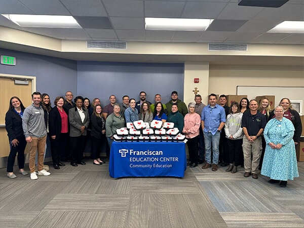 Attendees at the recent Revive & Survive breakfast received AEDs for their applicable non-profit organizations.