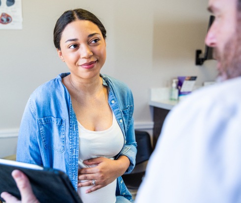 Expecting mother meeting with doctor