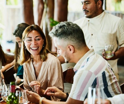People enjoying dinner together